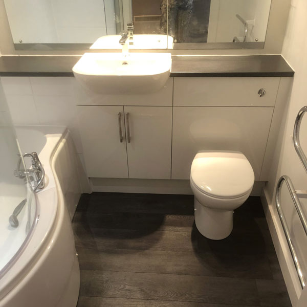 Vanity unit and toilet in new bathroom